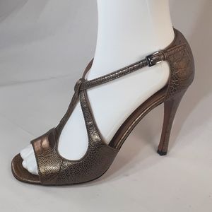 Alaia gold alligator heels